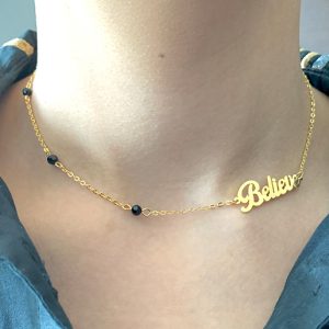 NECKLACE WITH ONYX STONES AND WORD "BELIEVE"