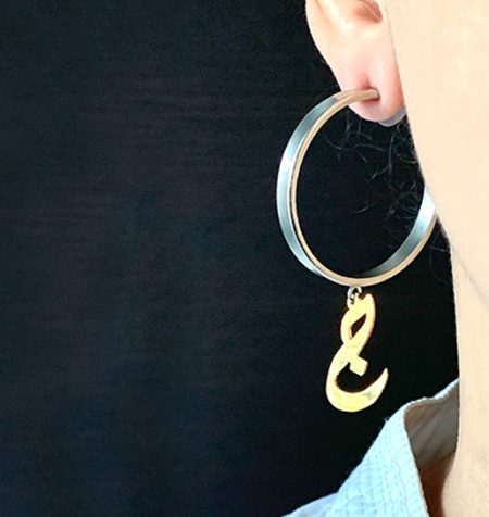 HOOP SHAPED EARRINGS WITH A LETTER "G"IN ARABIC